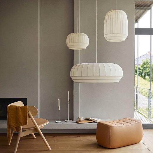 Calm living space with sculptural pendant lights